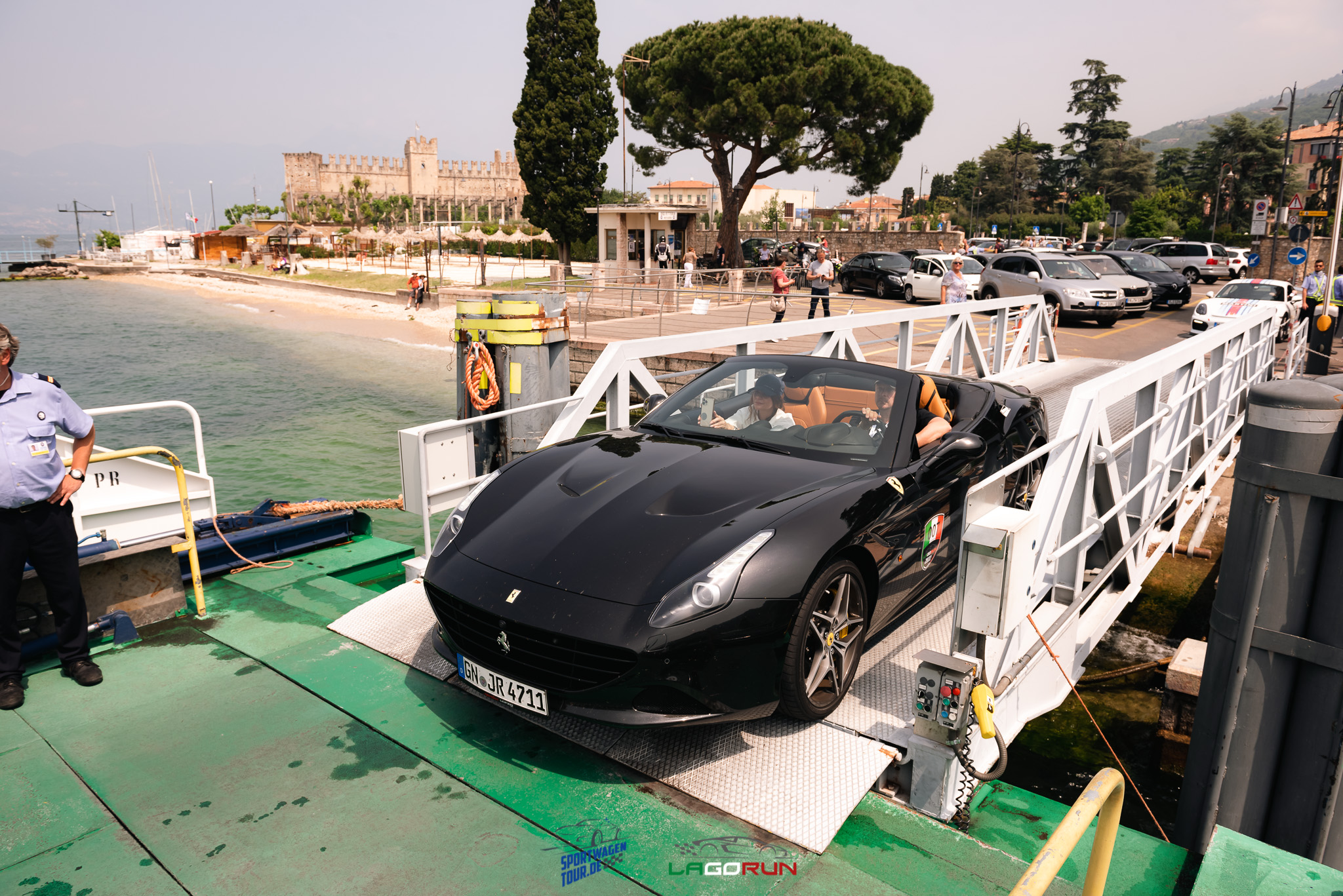 A Ferrari boarding a ferry during a previous LagoRun in Italy
